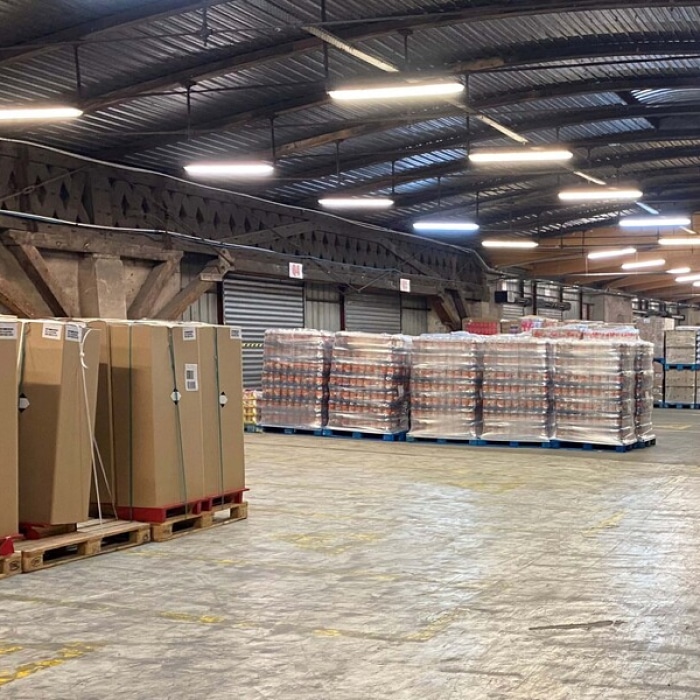 service2 Entrepôt Breney Frères avec palettes de marchandises, solution de logistique et transport routier à Montauban